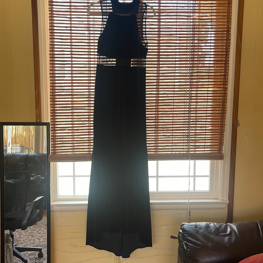 Navy blue velour dress. Worn once. In very good shape. Very flattering size 12